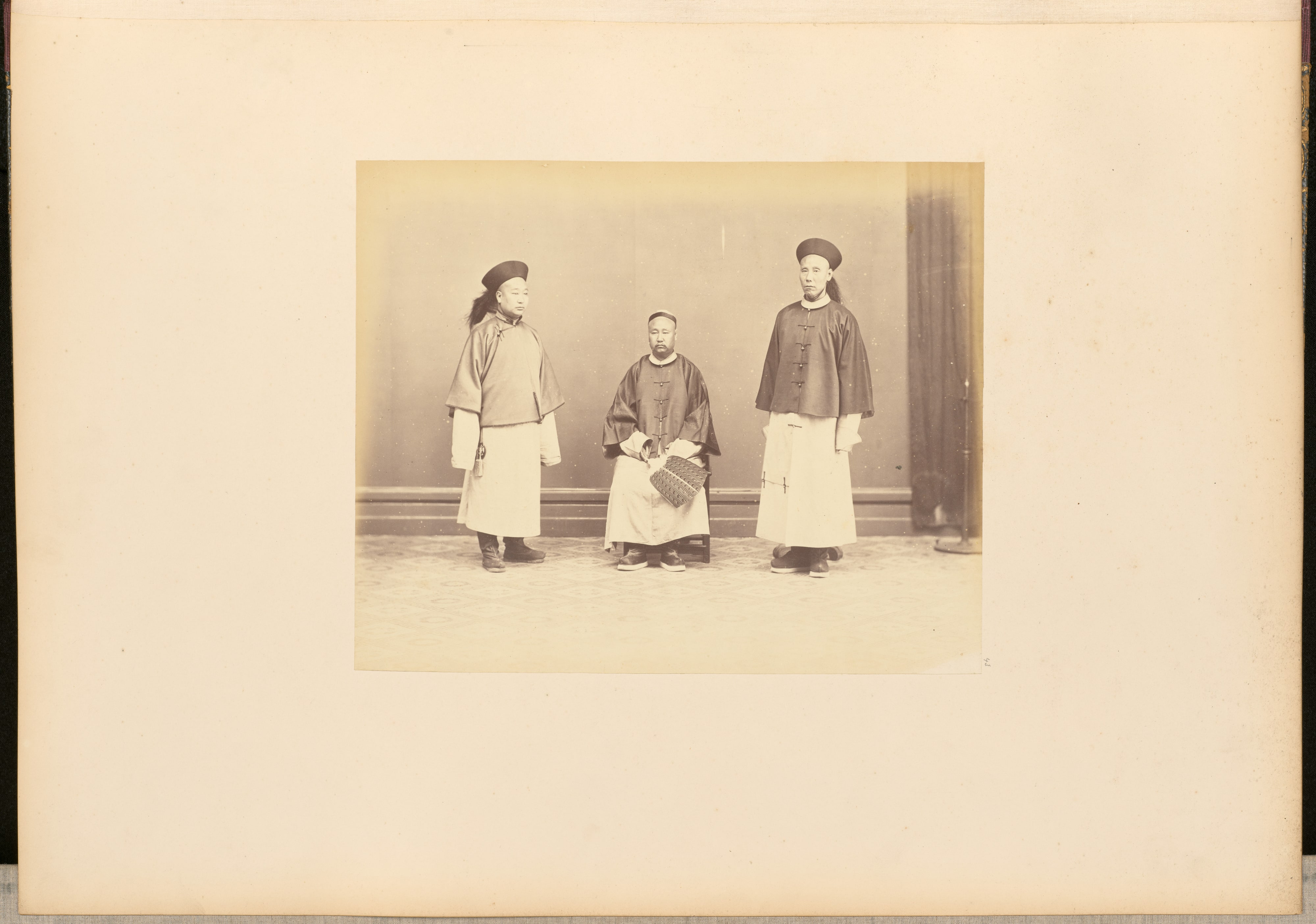 [Group portrait of three men, Hong Kong]
