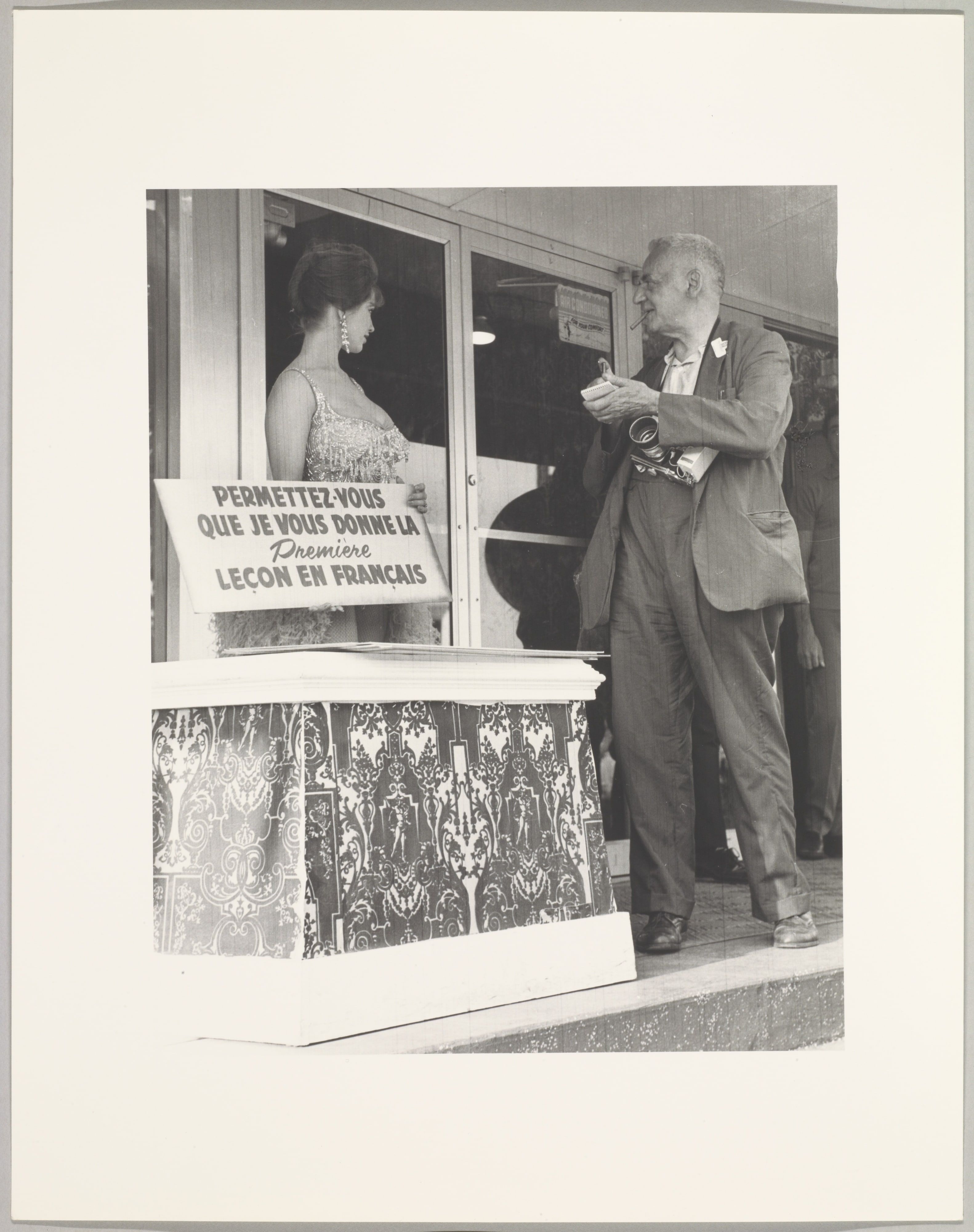 Weegee Trying to Pick Up Girl at World's Fair