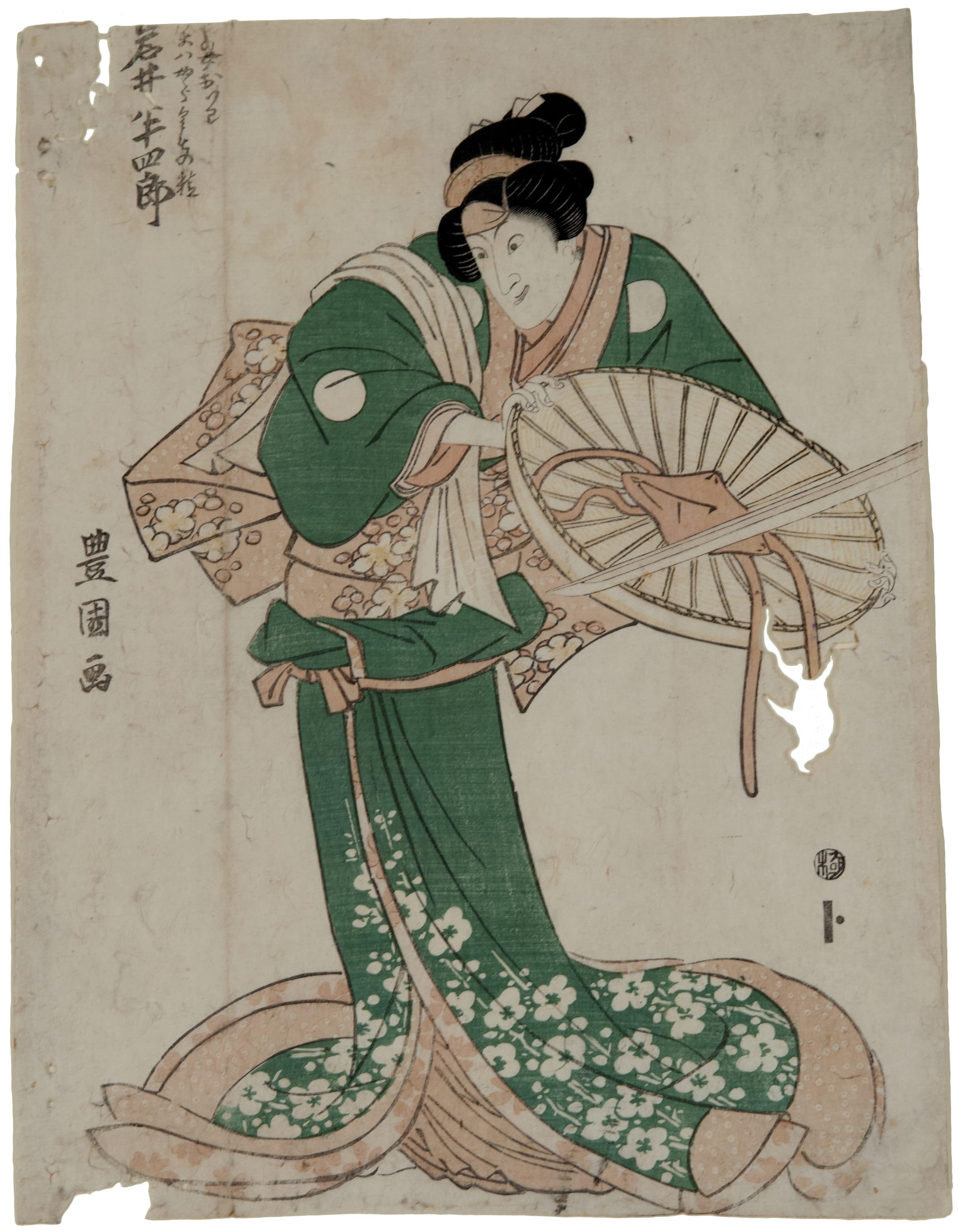 The actor Iwai Hanshiro V as Oiwa, a disguise of the spirit of the Spider Courtesan