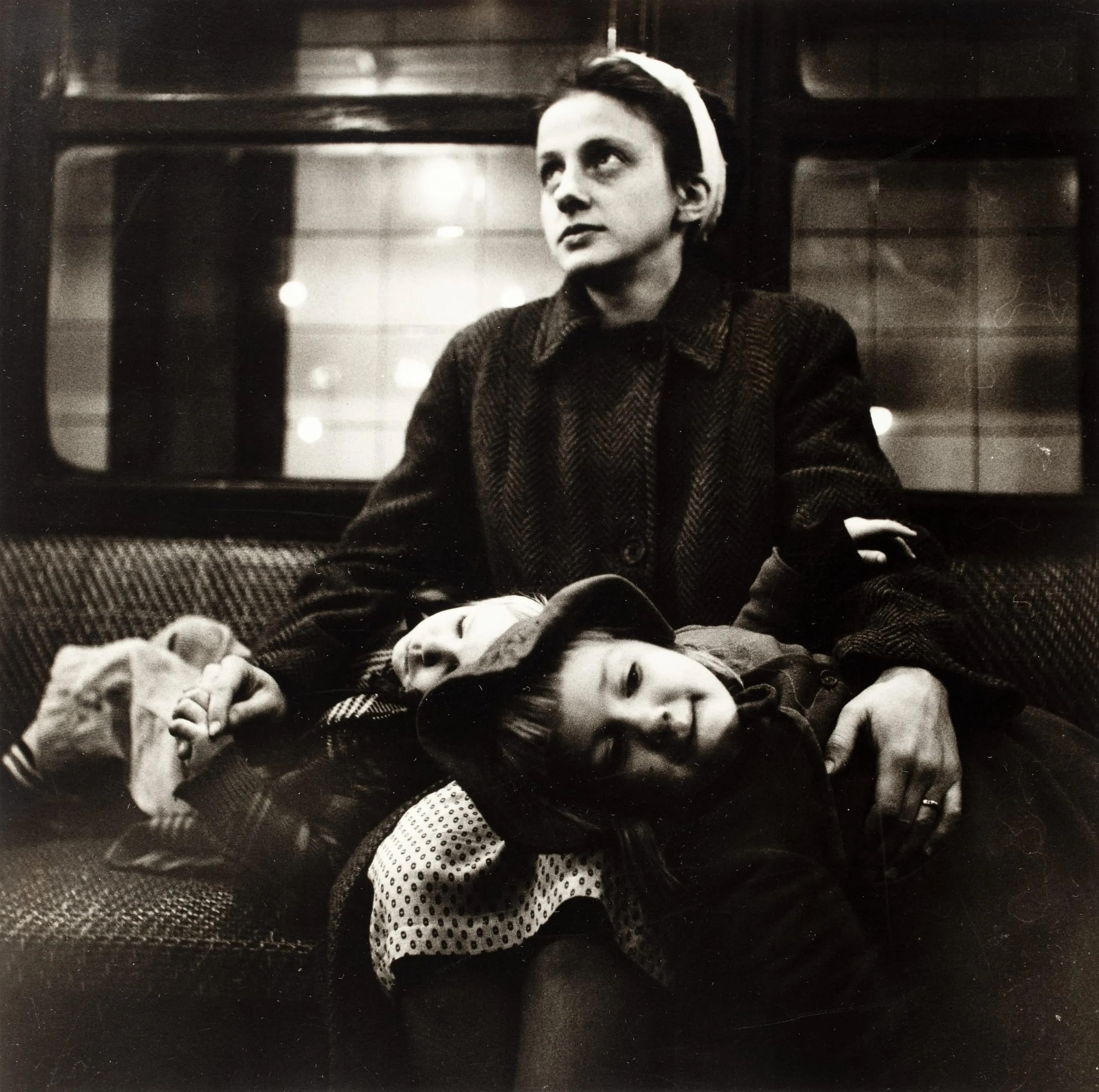 Woman With Children In Subway