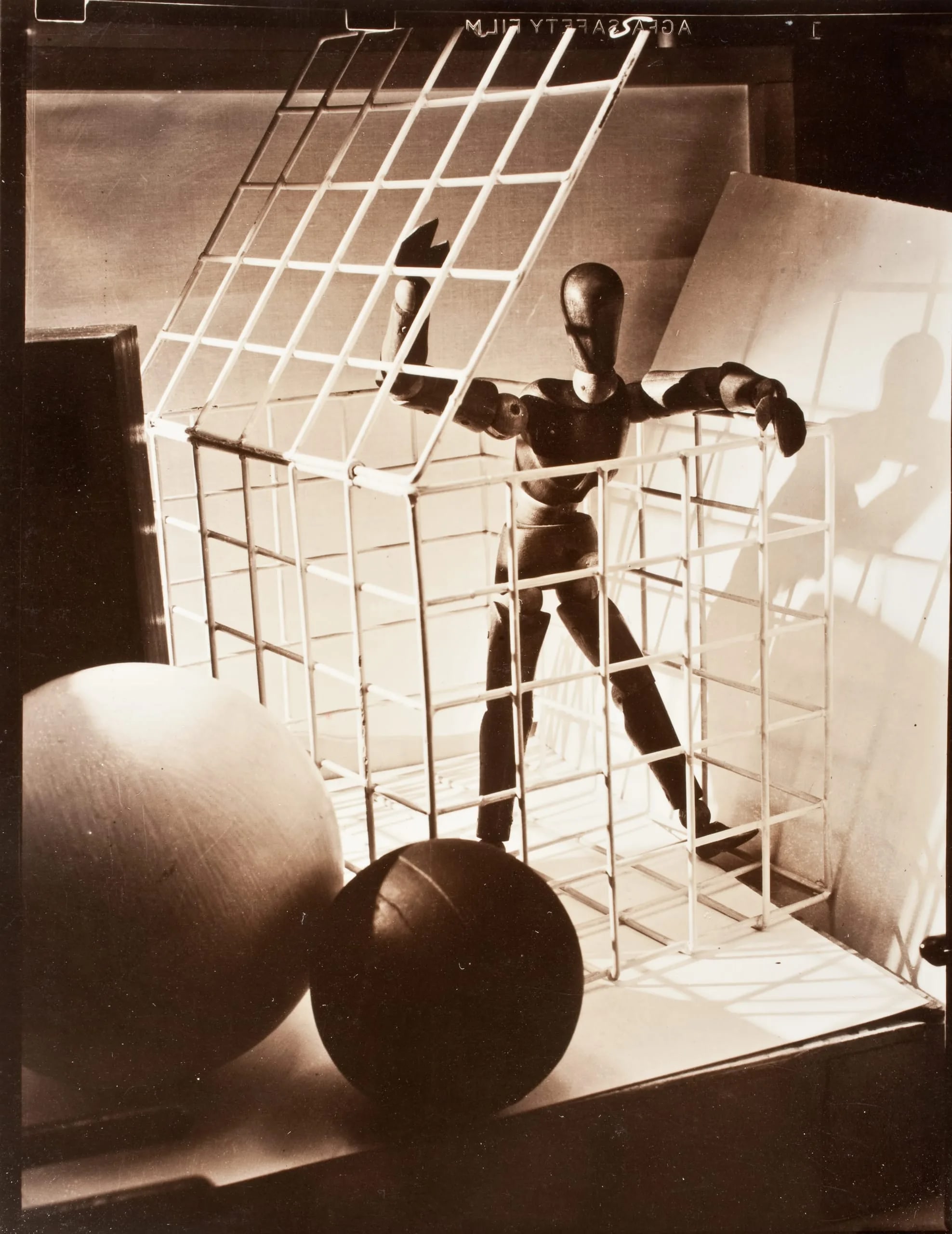 Figure In Cage