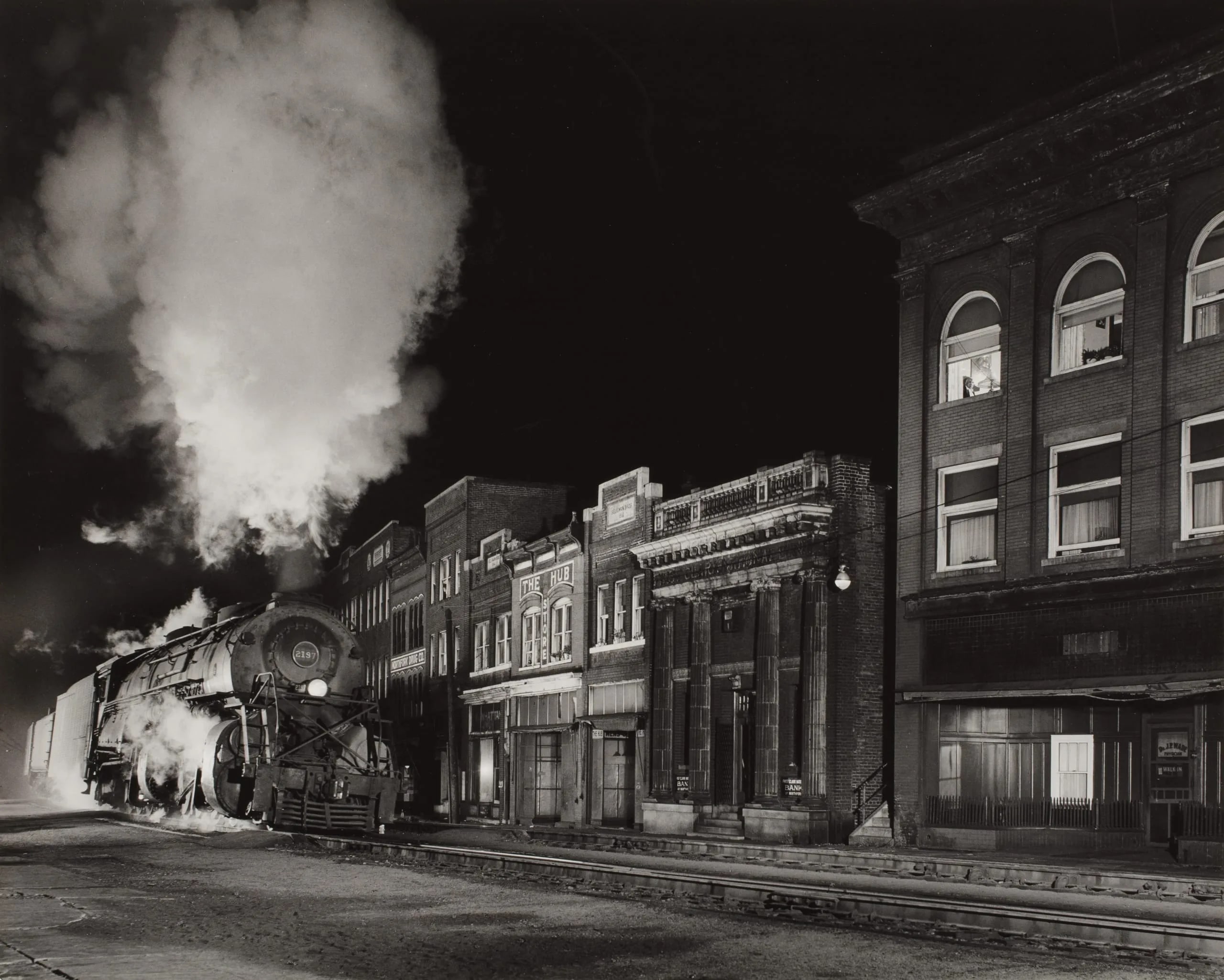 Train Through Main Street At Night