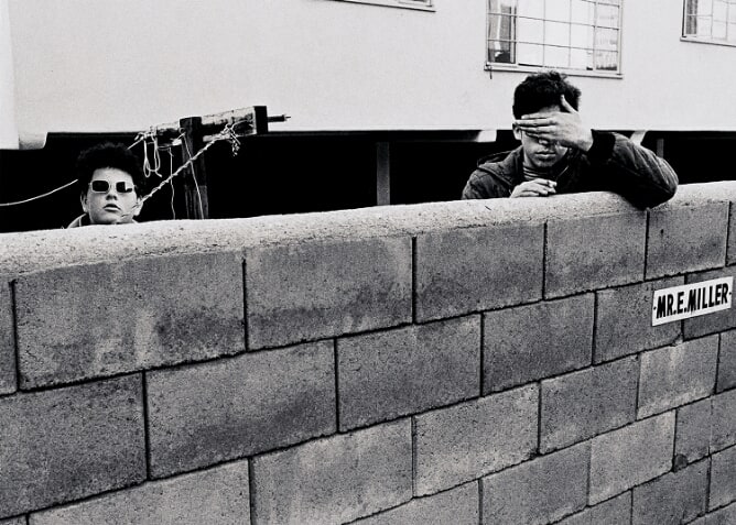 Untitled (Two Teenagers Behind Concrete Wall)