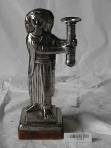 Candleholder, representing woman