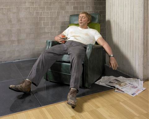 Man in Chair with Beer