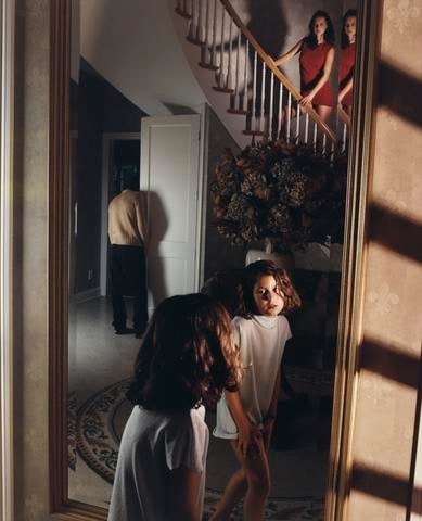 Nicole Looking in the Mirror