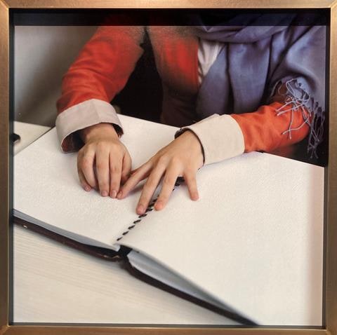 Asiye, a blind student, learns to read Arabic in braille. Her aim is to memorize the Quran within the next two years and become a Hafiz. Istanbul, 2020, from the series Hafiz