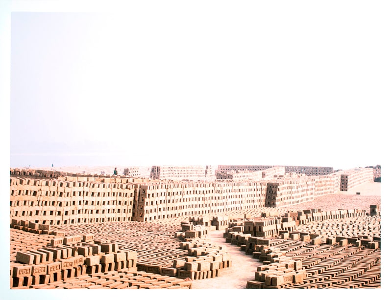 Bricks, humans, water, earth and space