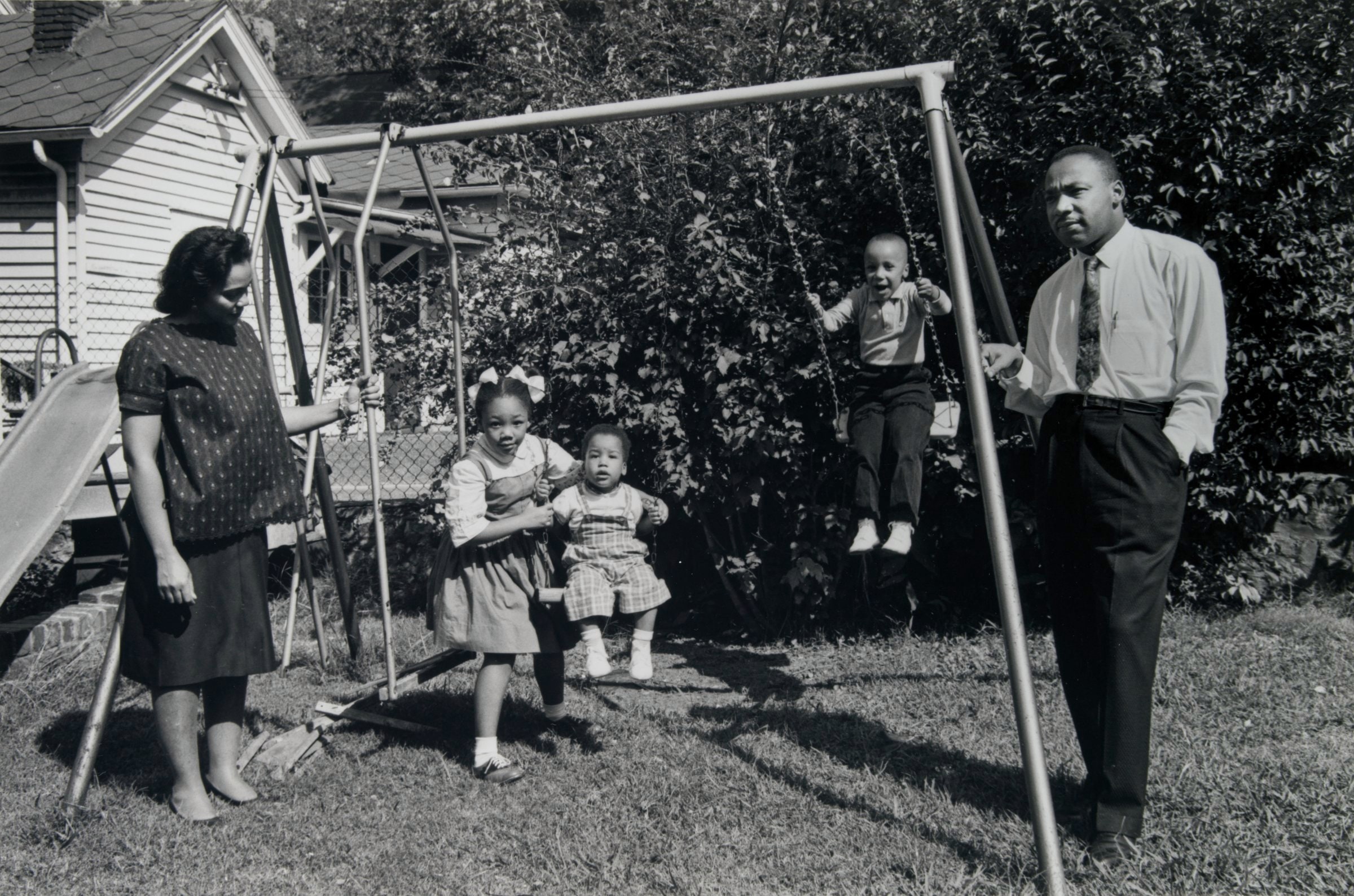 Dr. Martin Luther King Jr. at Home with His Family, 1962 (in Front of Swing Set)