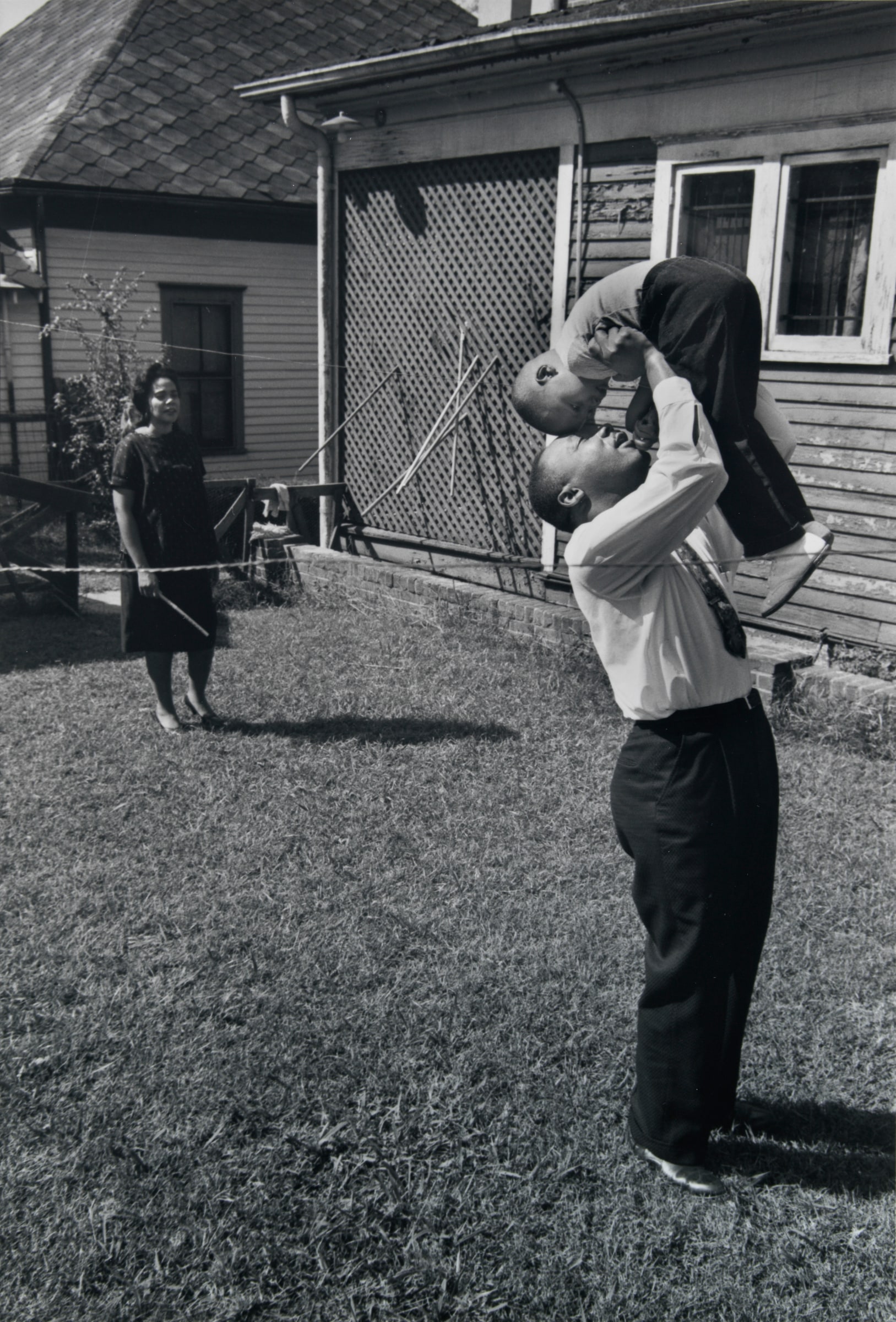 Dr. Martin Luther King Jr. at Home with His Family, 1962 (Holding Son Aloft)