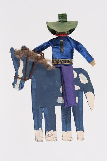 blue horse and rider with green hat