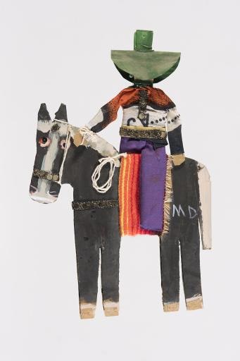 black horse and rider with purple pants