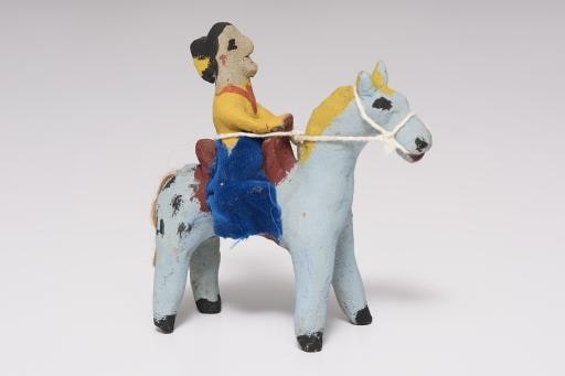 blue horse with rider