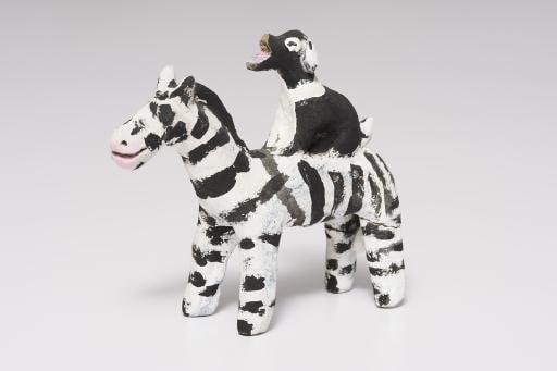 zebra with dog