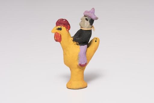 yellow chicken with human rider