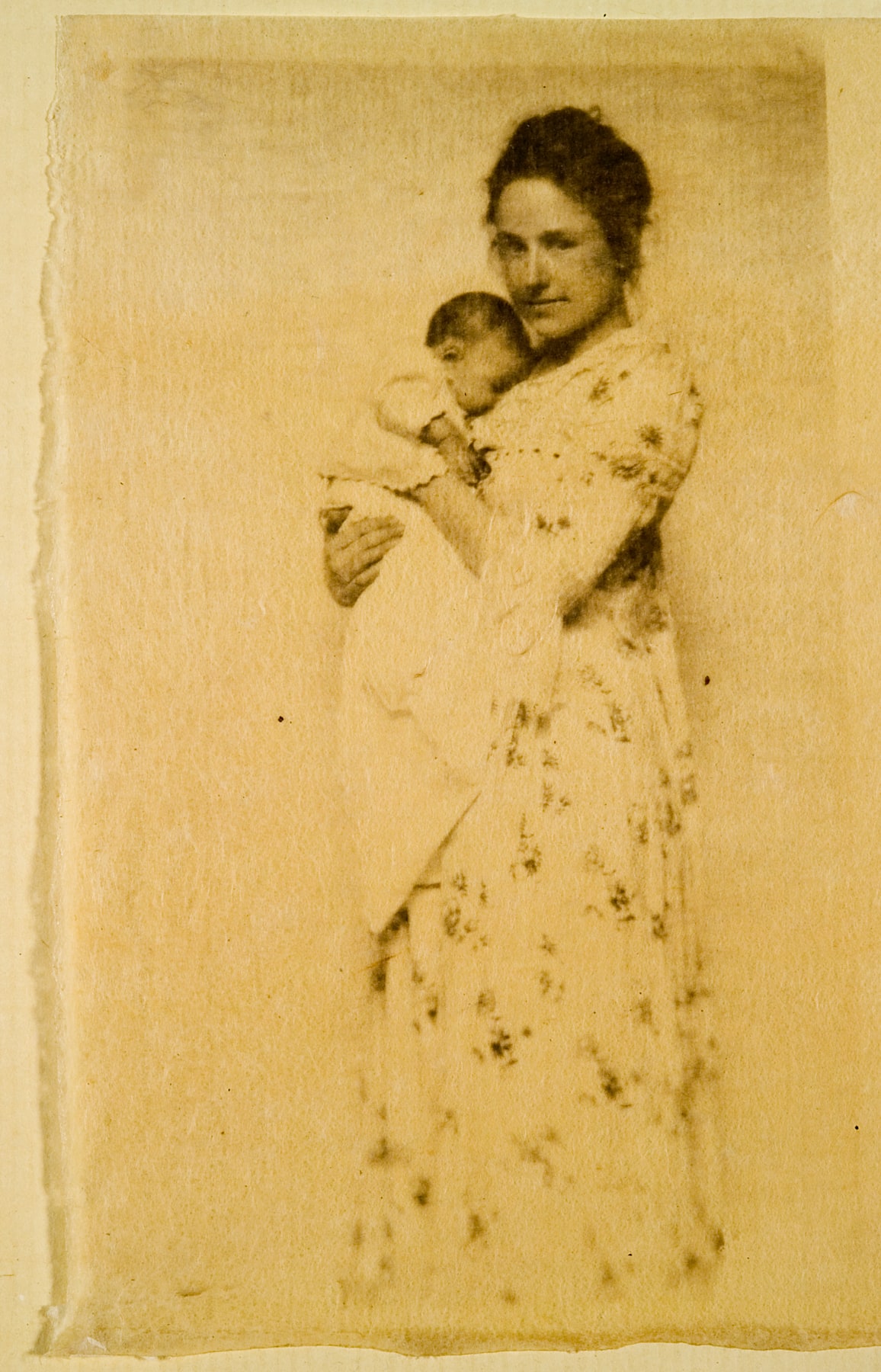 untitled (woman holding a baby)