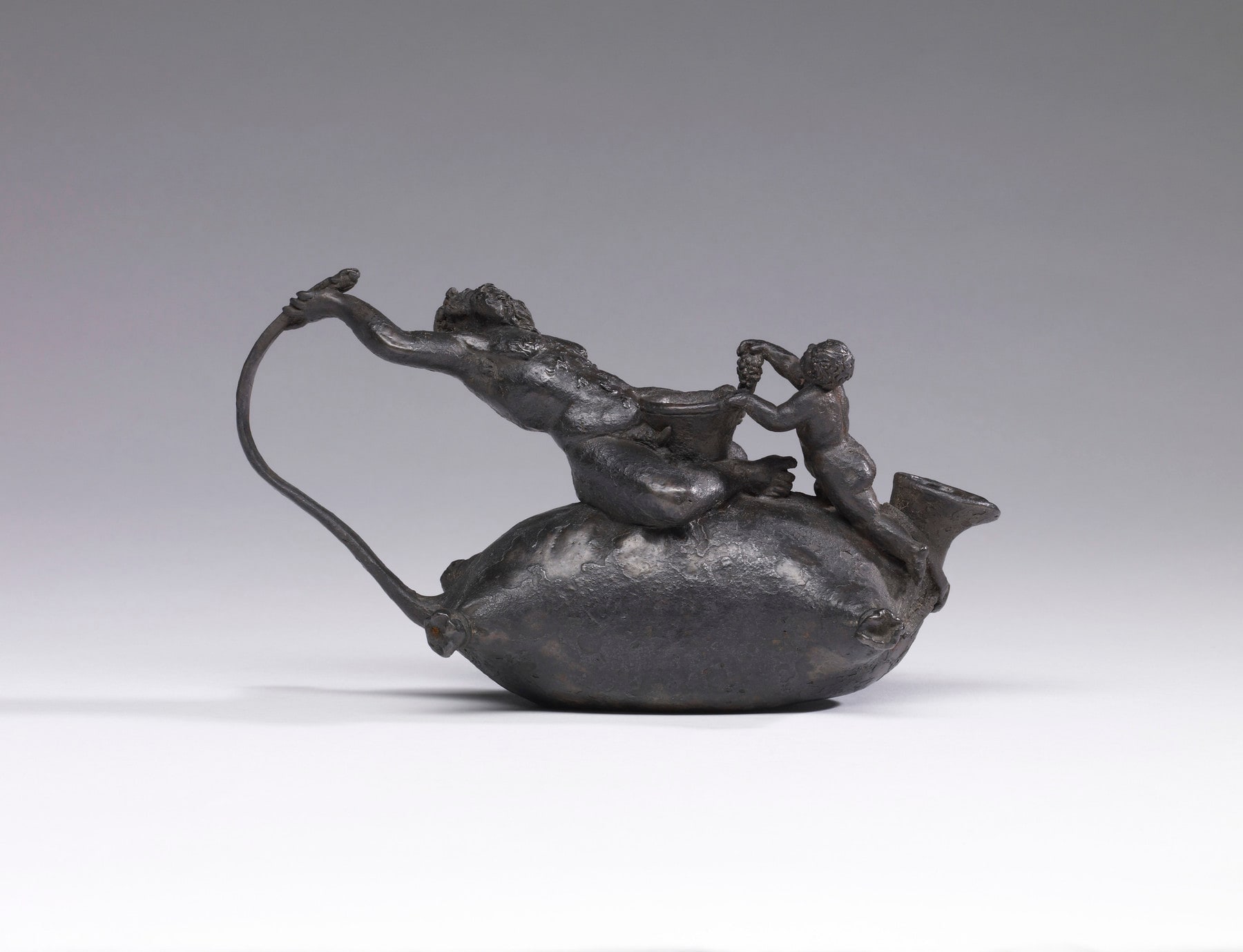 Oil Lamp in the Shape of Silenus Straddling a Wine-Skin