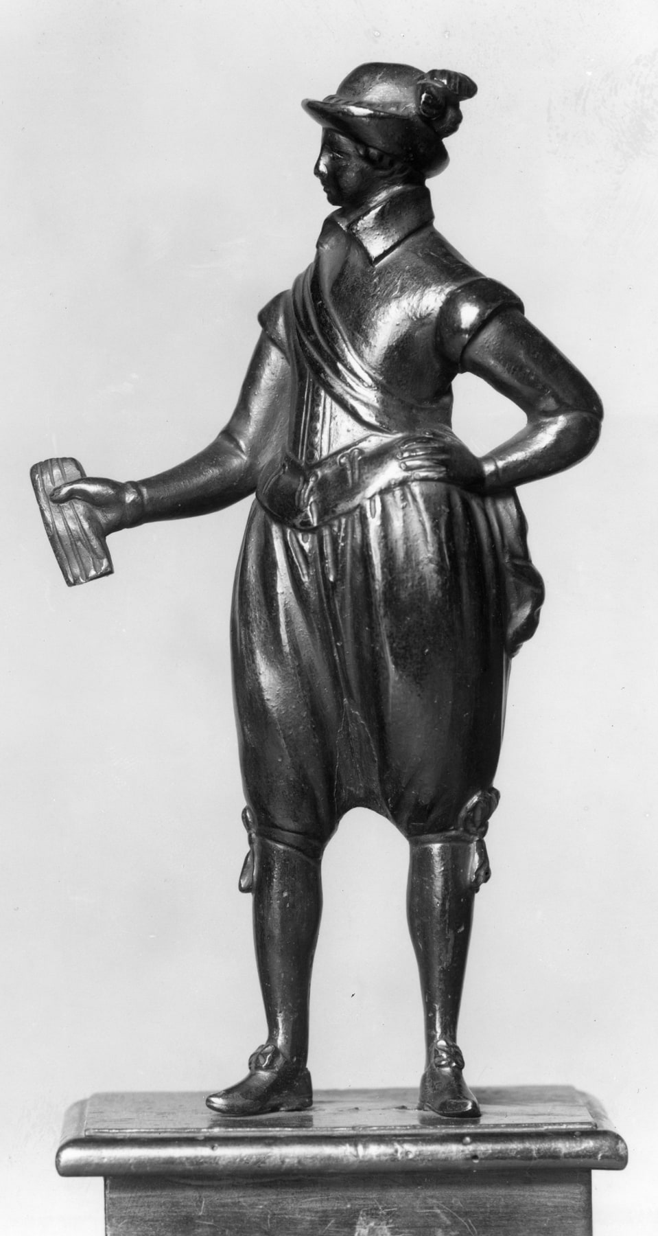 Young Man Holding Gloves