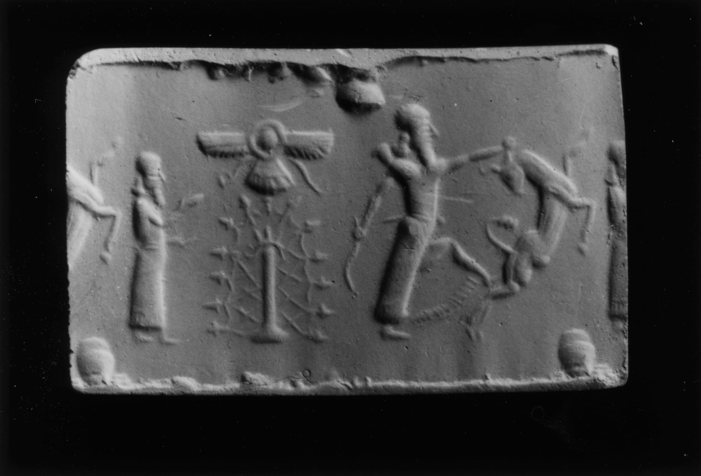 Cylinder Seal with a Contest Scene and a Cultic Scene