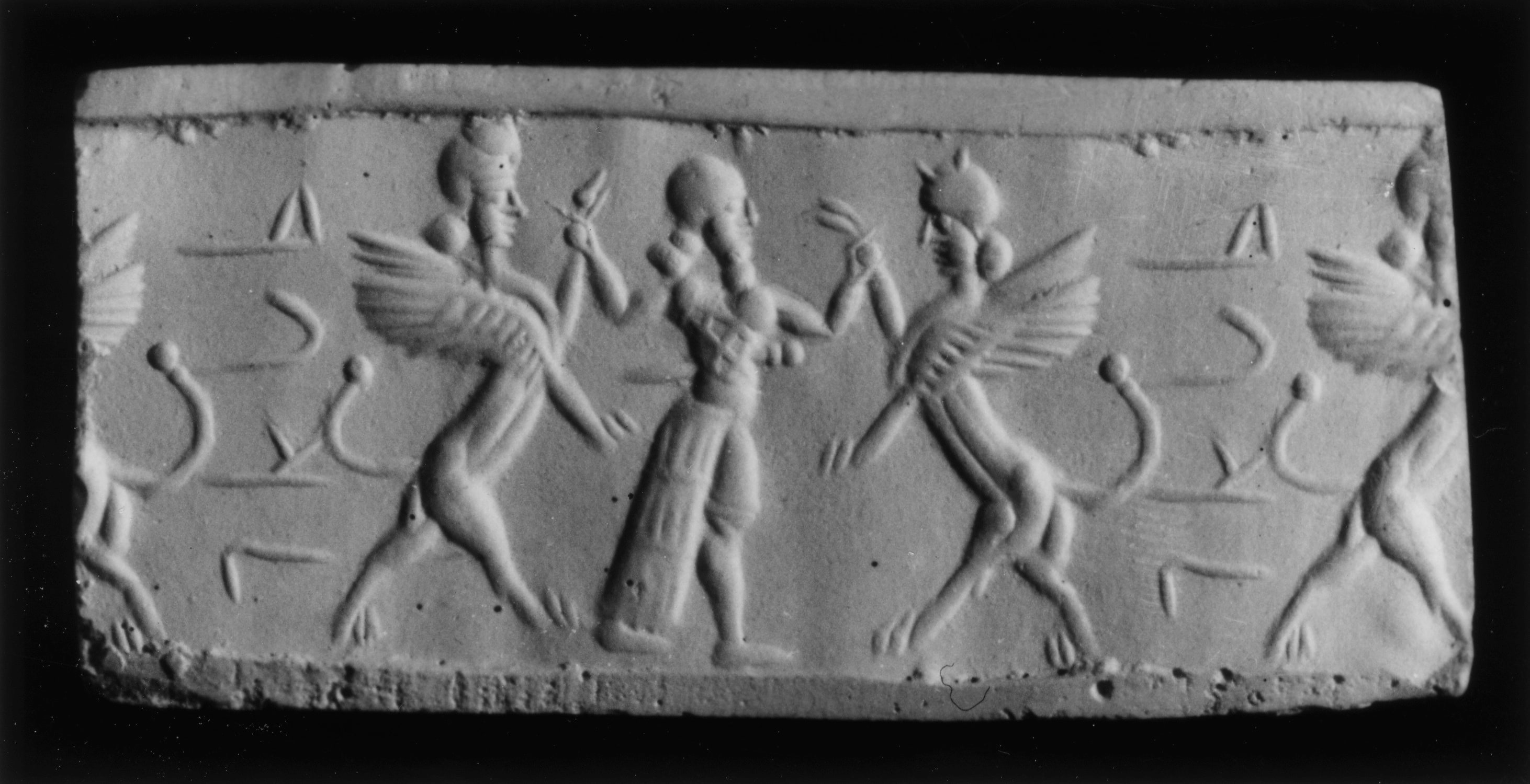 Cylinder Seal with a Contest Scene and an Inscription