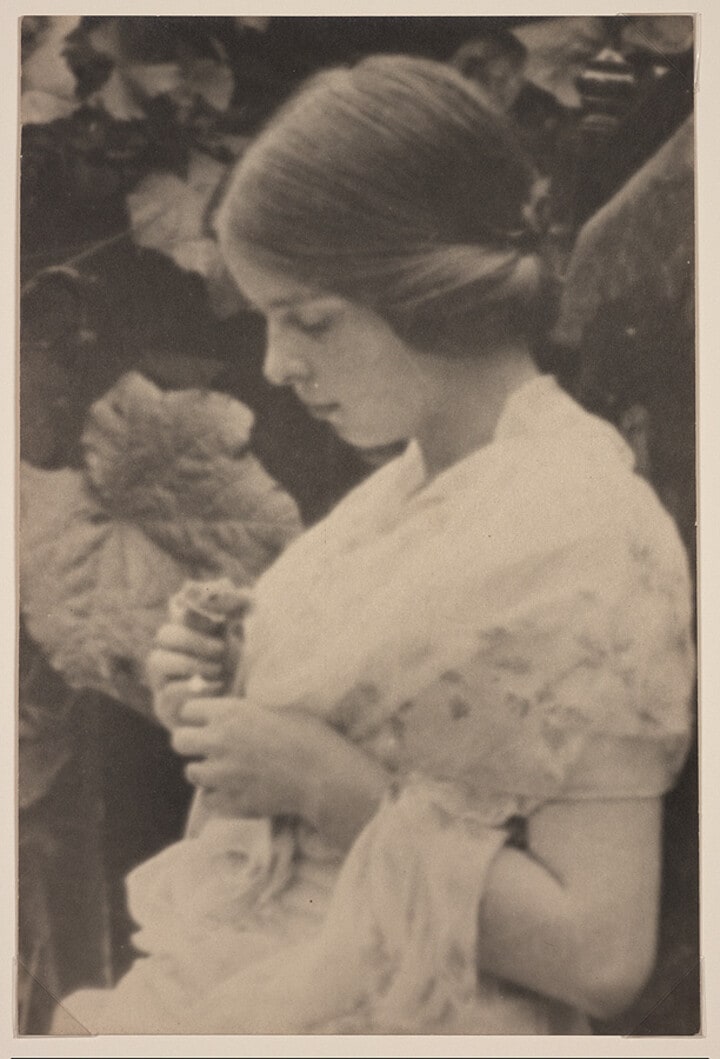 Gladys Shields Looking at a Rose