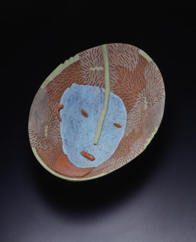 Oval bowl with blue face
