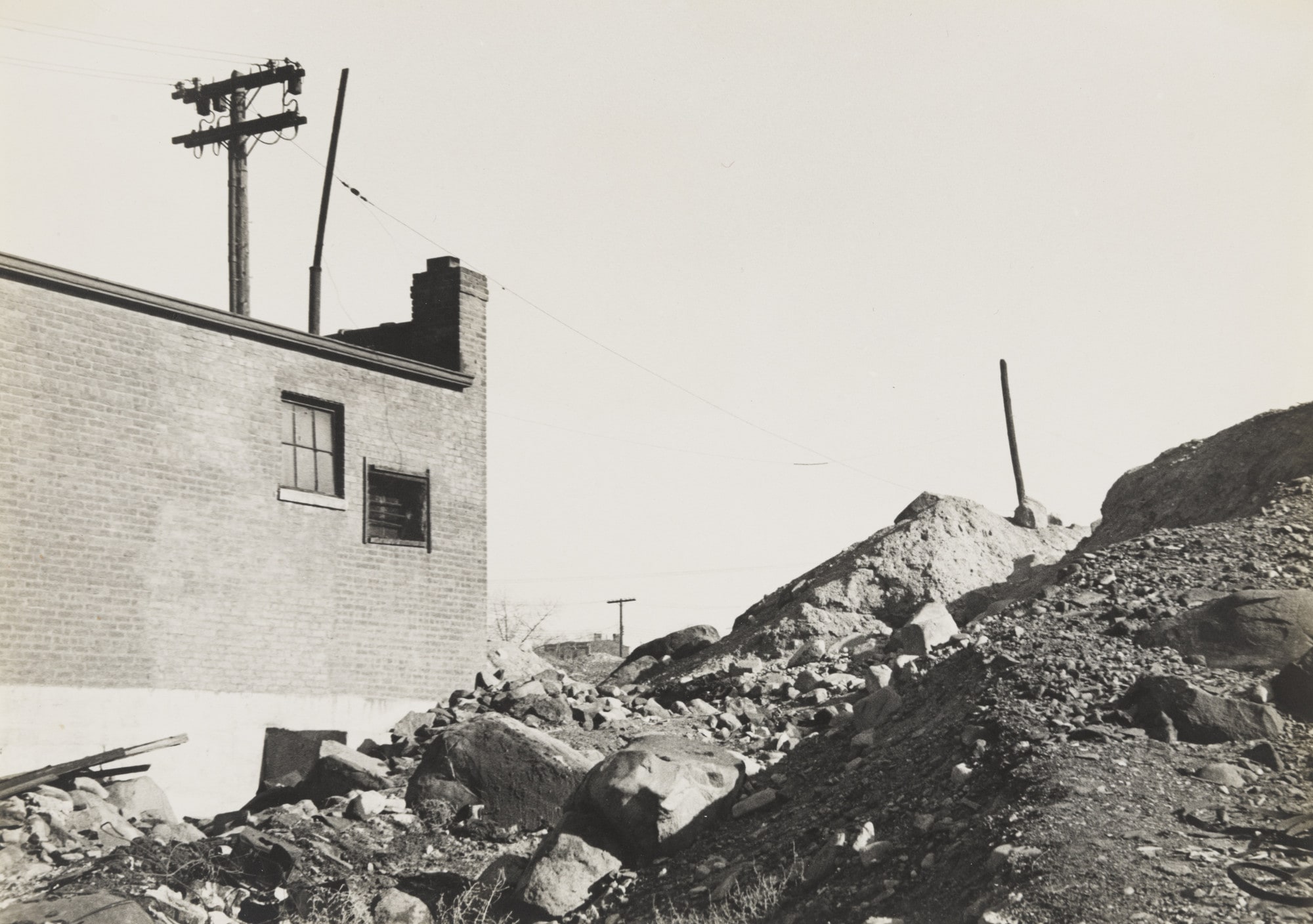 Laurel Hill, Queens. (building and mounds of dirt)