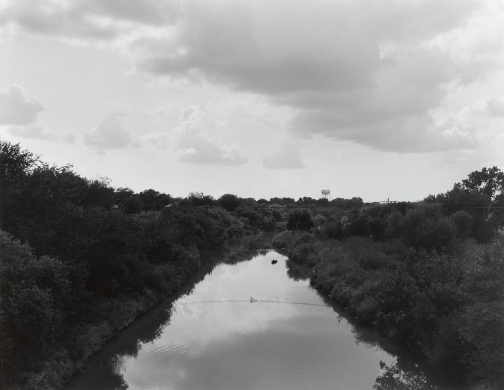 Wichita River/Looking East from Scott St., Wichita Falls, Texas. (water tower in background)