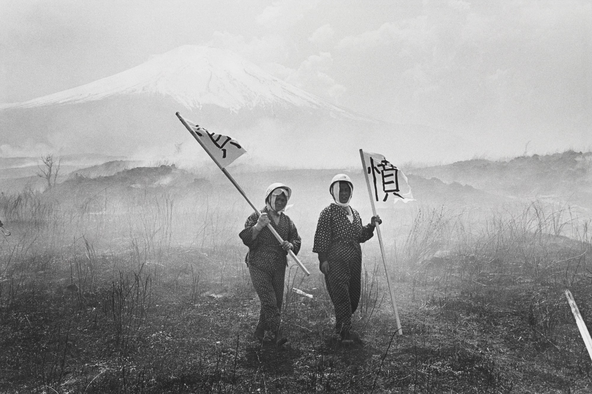 Two Lady Farmers in an Anti-War Demonstration Forcing Their Way into the U.S. Army Maneuver Area at the Foot of Mt. Fuji