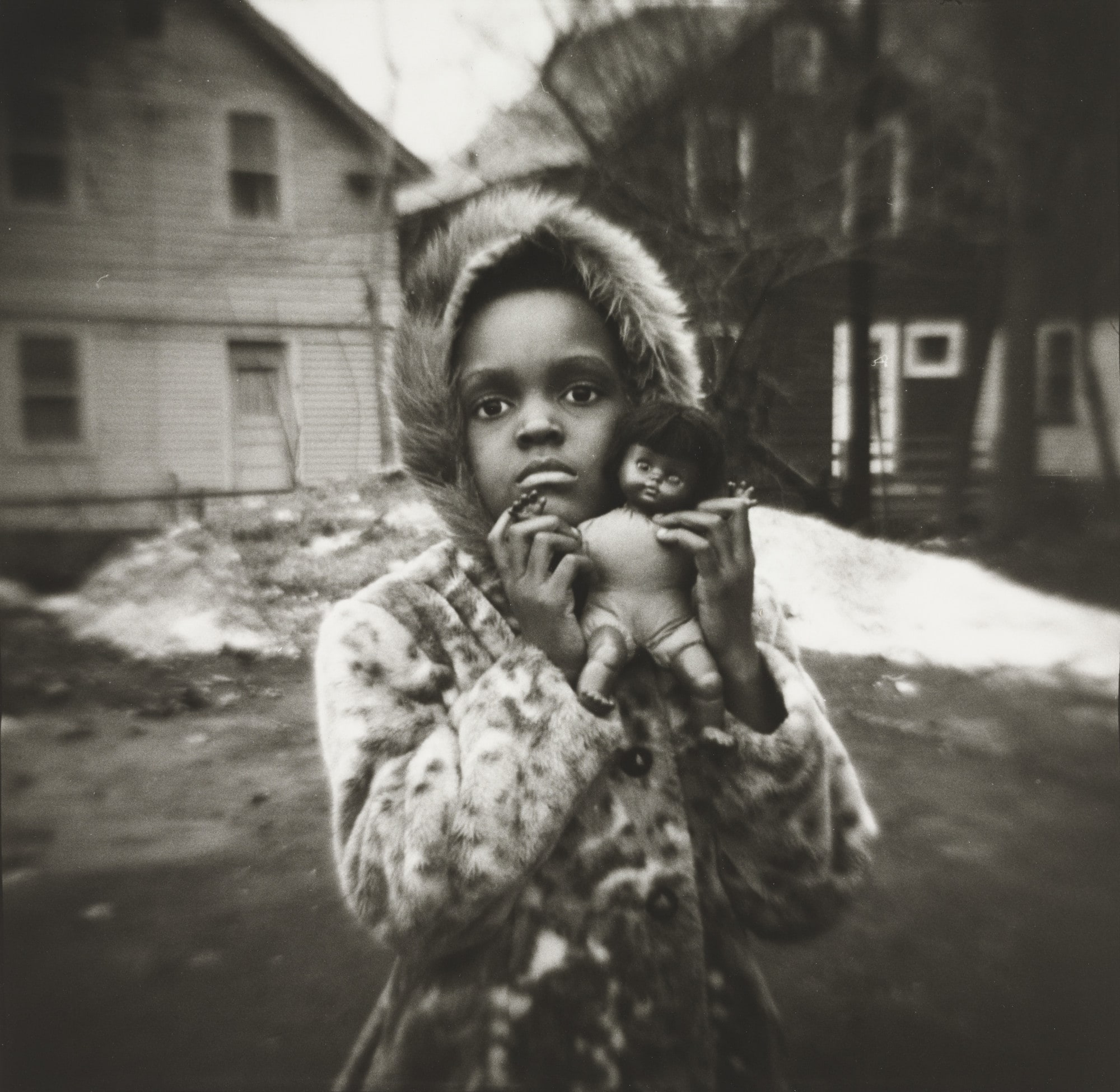 Mishael C. Holding Her New Black Doll