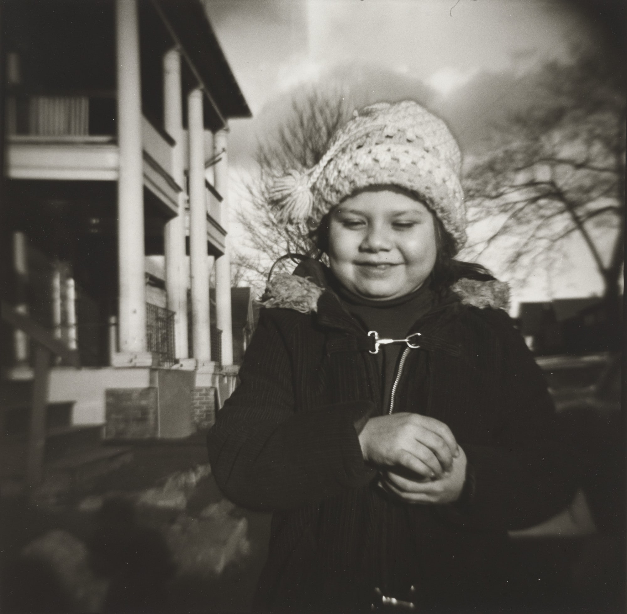Brenda B. in Front of Her House