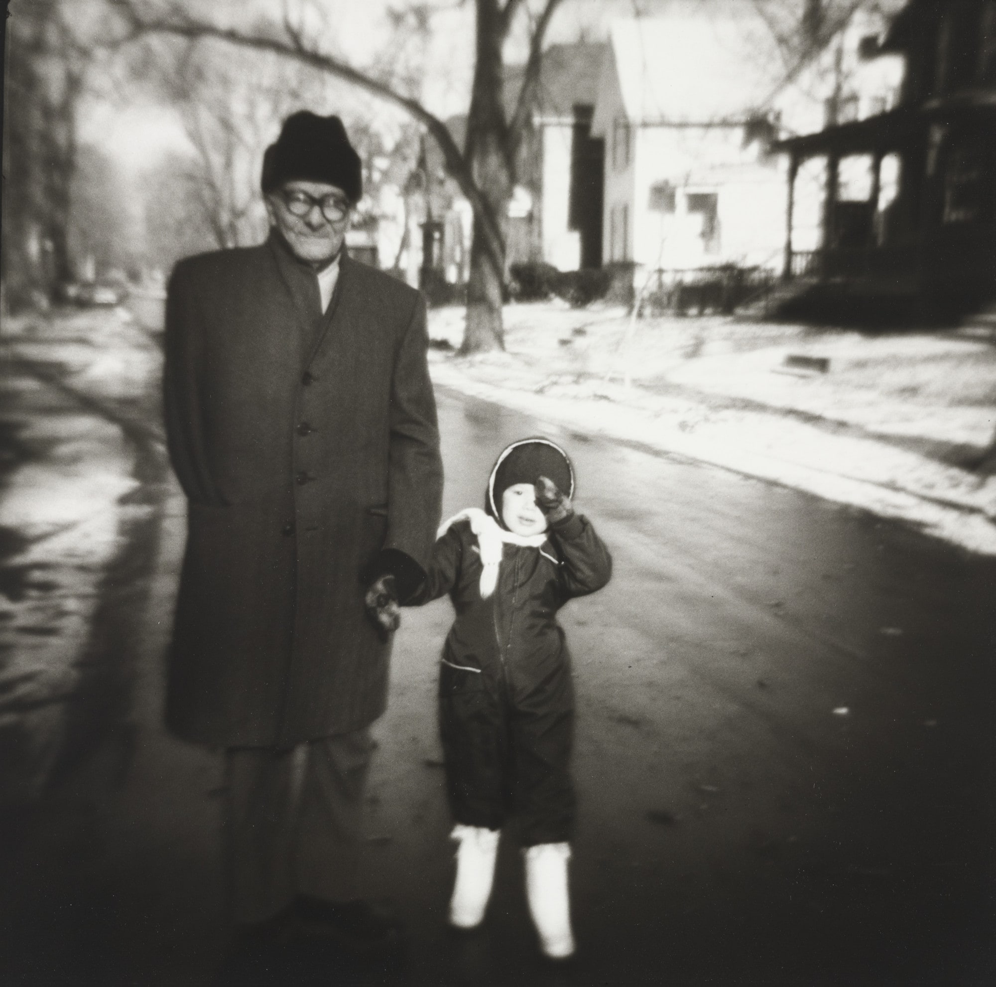 Russian Man with His Grandson on the First Sunny Day of a Long Winter
