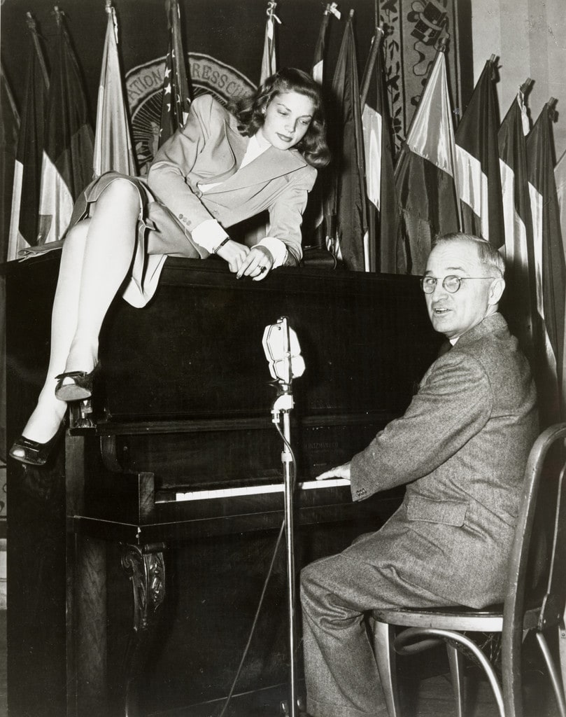 President Truman and Lauren Becall at the Press Club Canteen