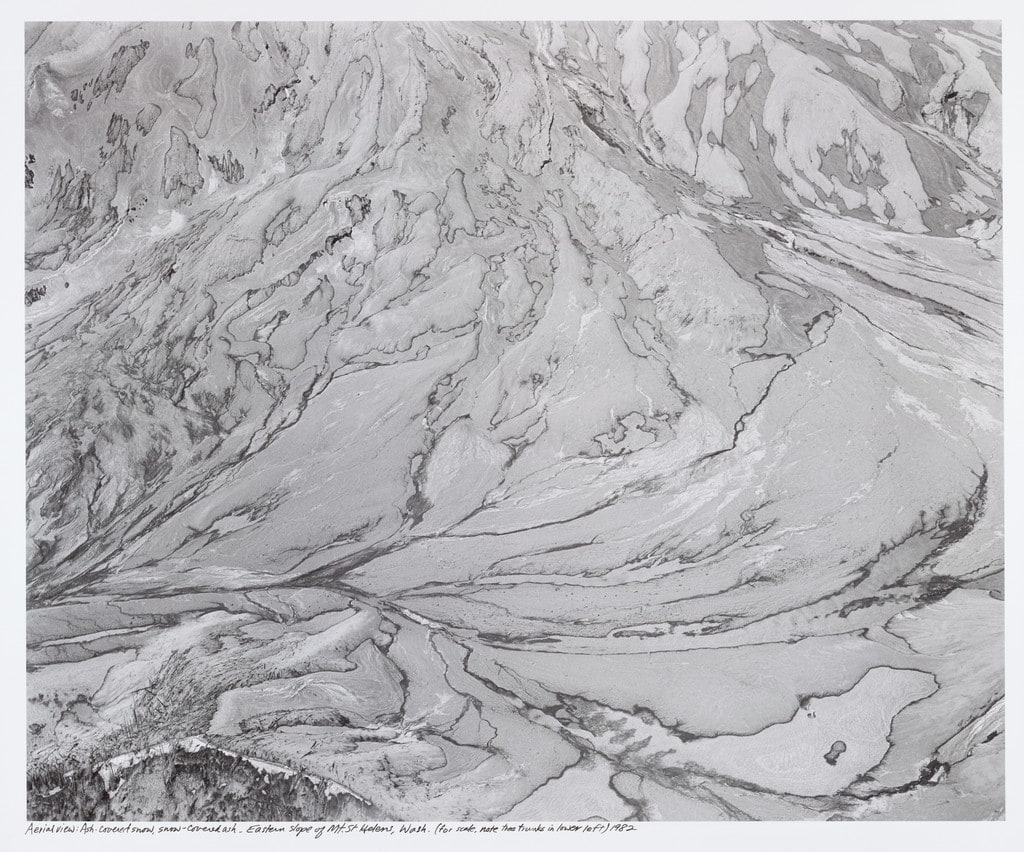 Aerial view: ash-covered snow, snow-covered ash. East flank of Mount St. Helens