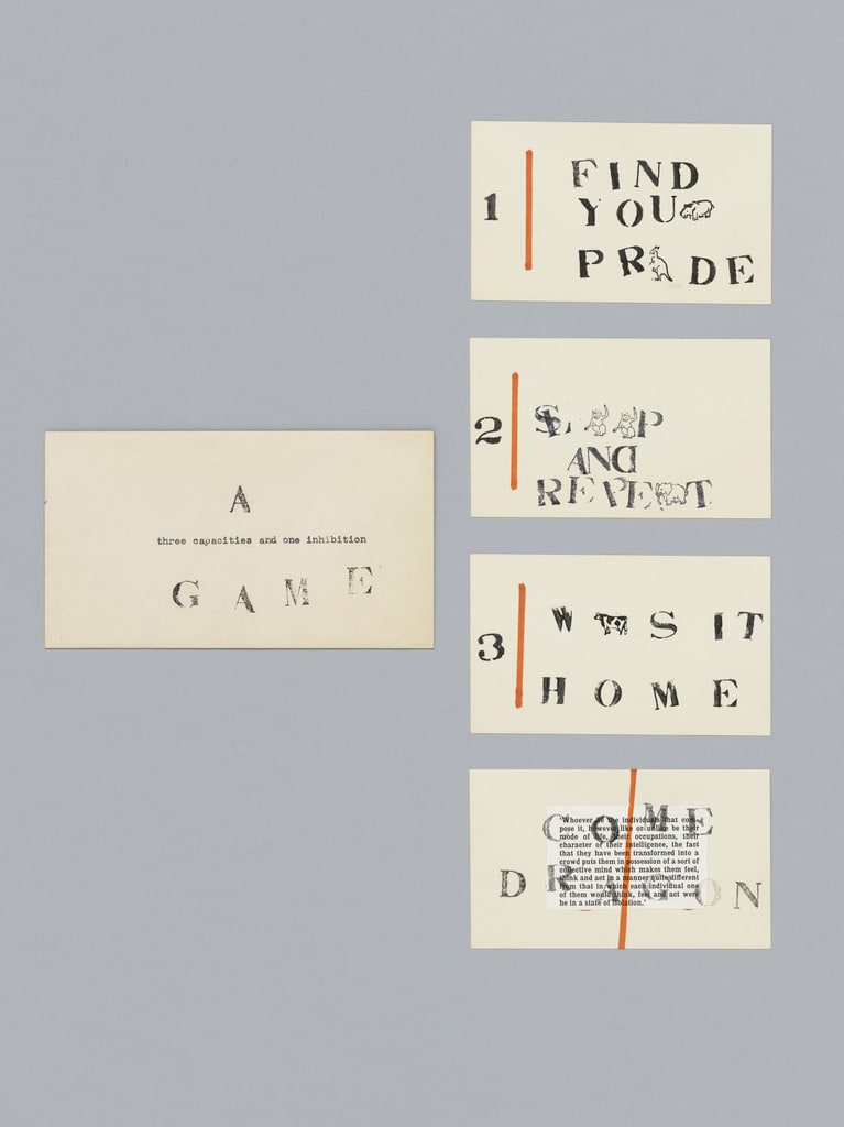 A Game: Three Capacities and One Inhibition