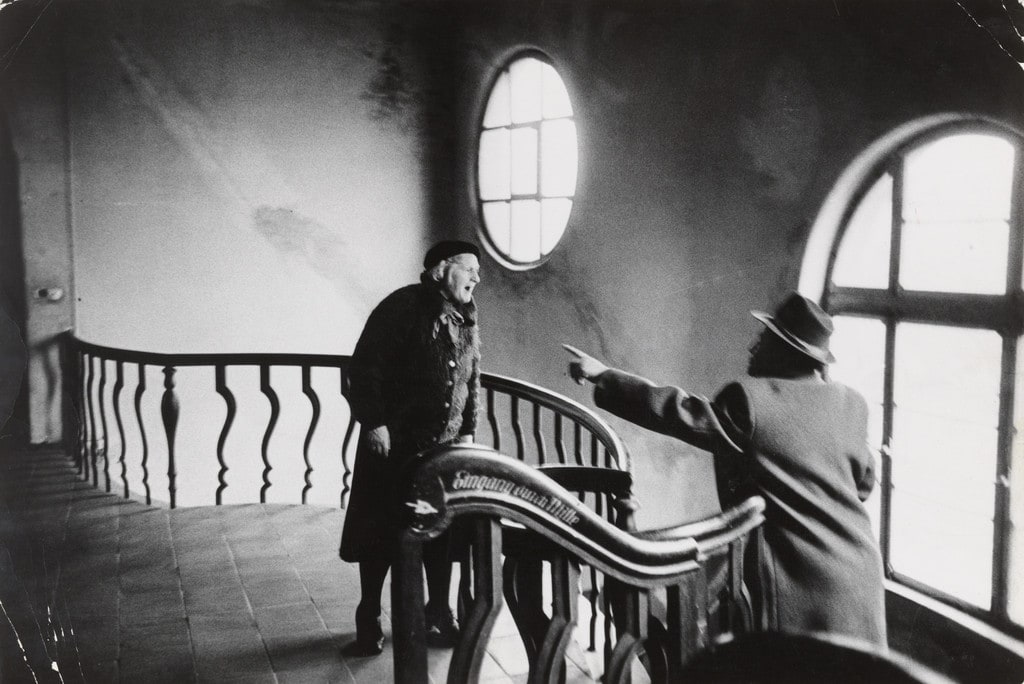Frankfurt am Main, West Germany: Neighbors fight on the stairway of an apartment building