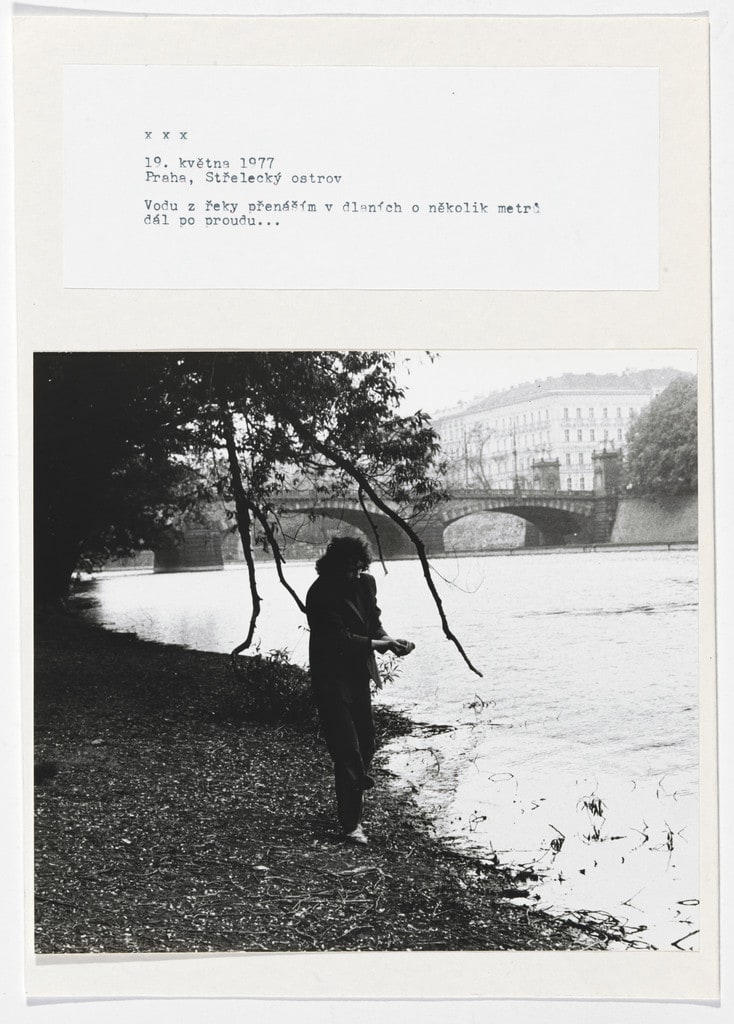 XXX, I carry some water from the river in my cupped hands and release it a few meters downriver...