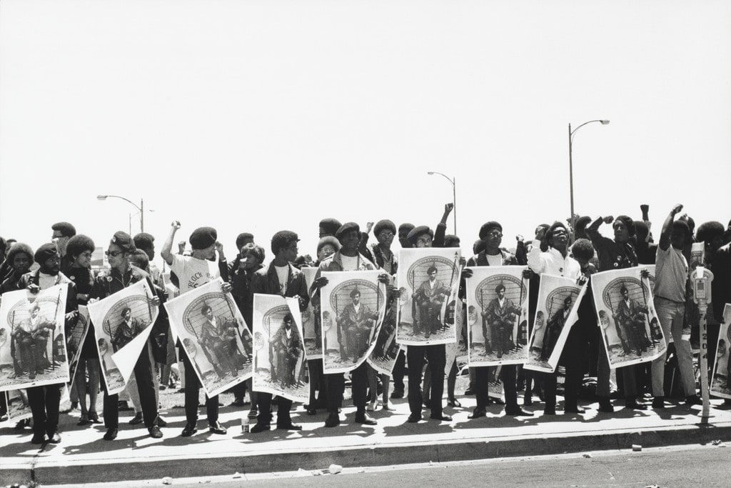 Black Panthers hold Free Huey signs at a rally at the Alameda County Courthouse where Black Panther Minister of Defense, Huey P. Newton, is on trial for killing an Oakland policeman, Oakland, California