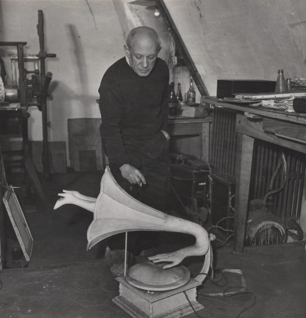 Untitled (Pablo Picasso with Oscar Dominguez's surrealist object Jamais, 1937)