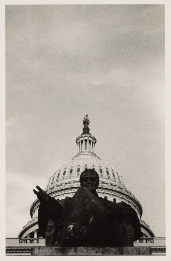 John Marshall statue with U.S. Capitol building in background