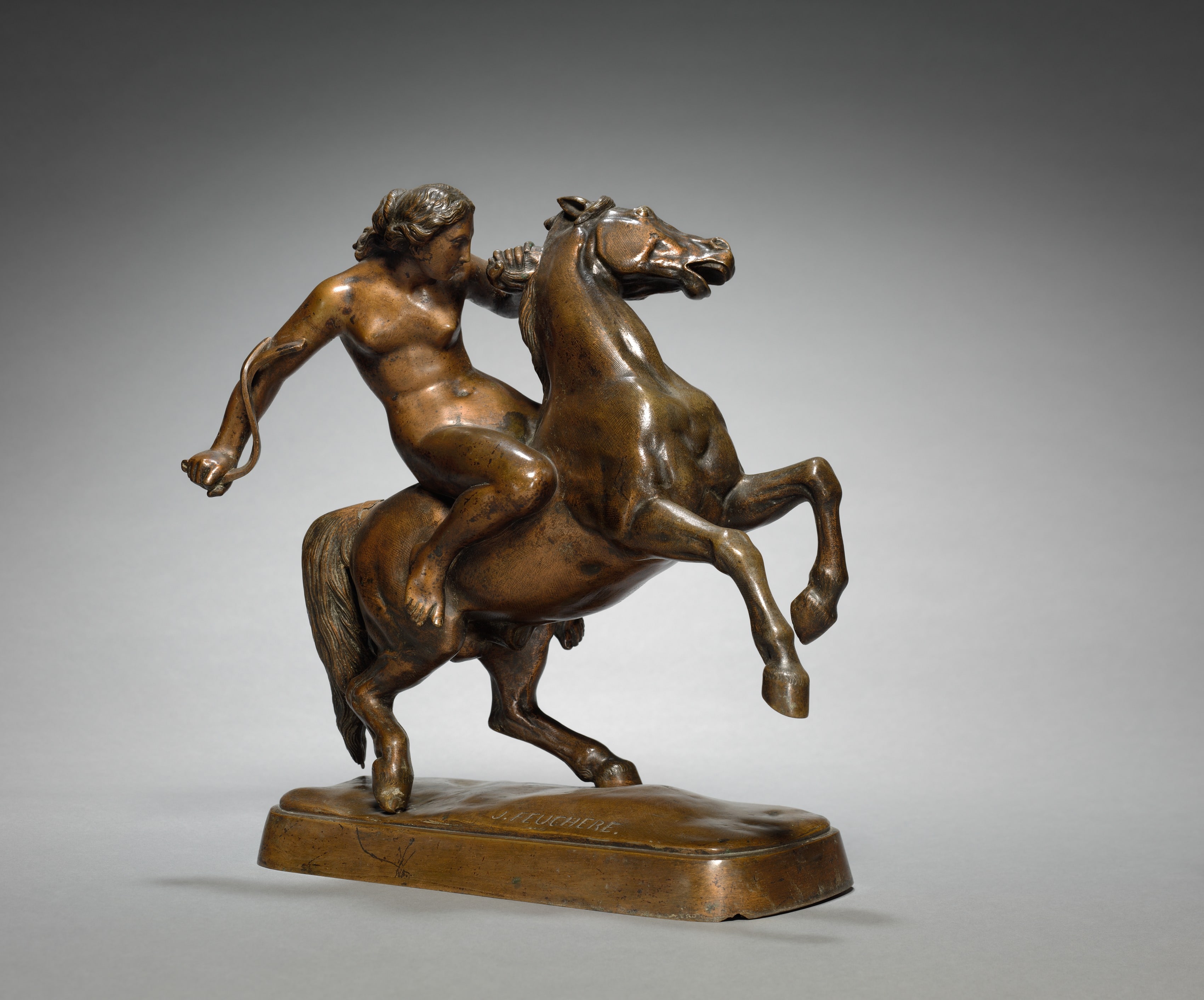 Amazon Taming a Horse
