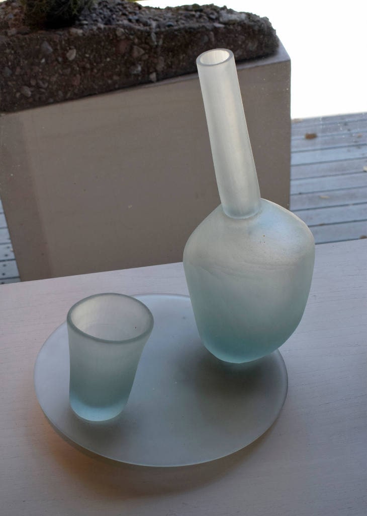 Bottle, glass, and plate sculpture