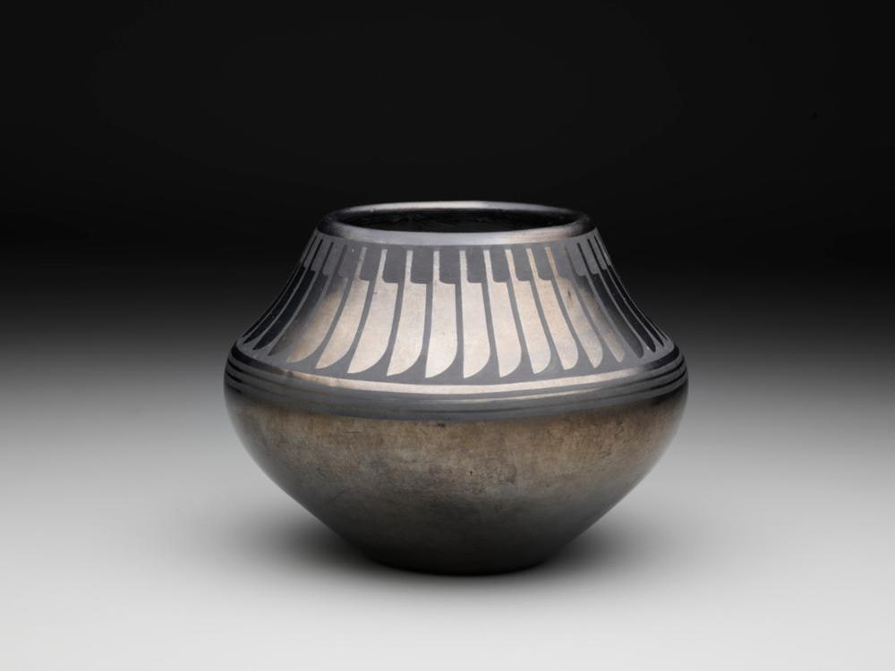 Jar with Feather Design