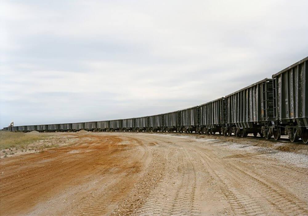 VS-12-76 Untitled (Rail car unloading) near Cotulla, Texas