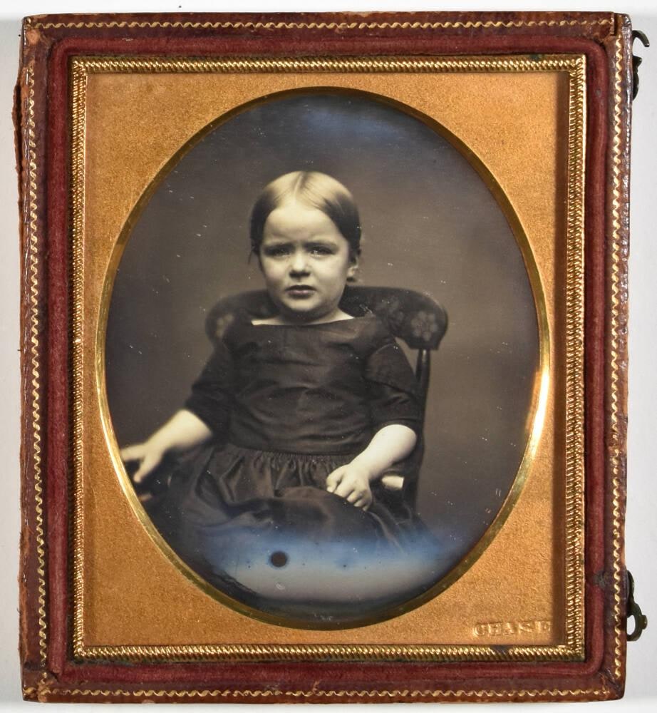 [Girl Seated in Floral Painted Chair]
