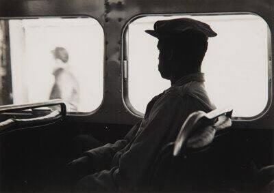 Untitled [Man sitting on the Bus]