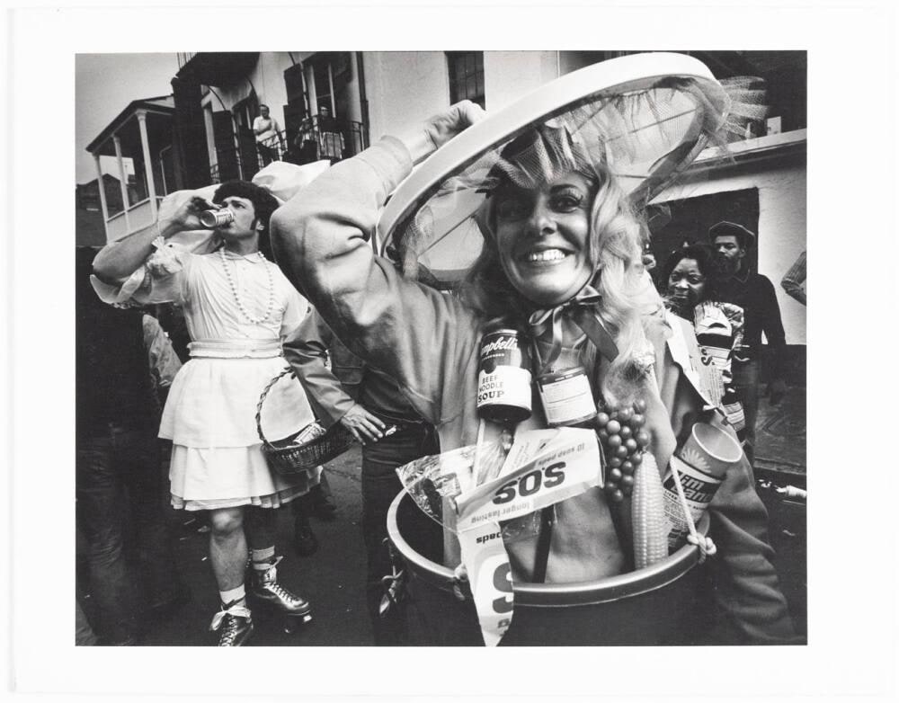 [Man Wearing Maid Costume Beer Rollerskates, Woman Wearing Food/SOS Costume]