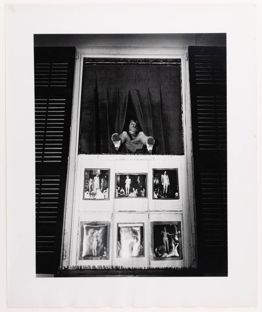 [Woman With Legs Hanging Outside Window, Six Panels of Partially Nude Women Below]