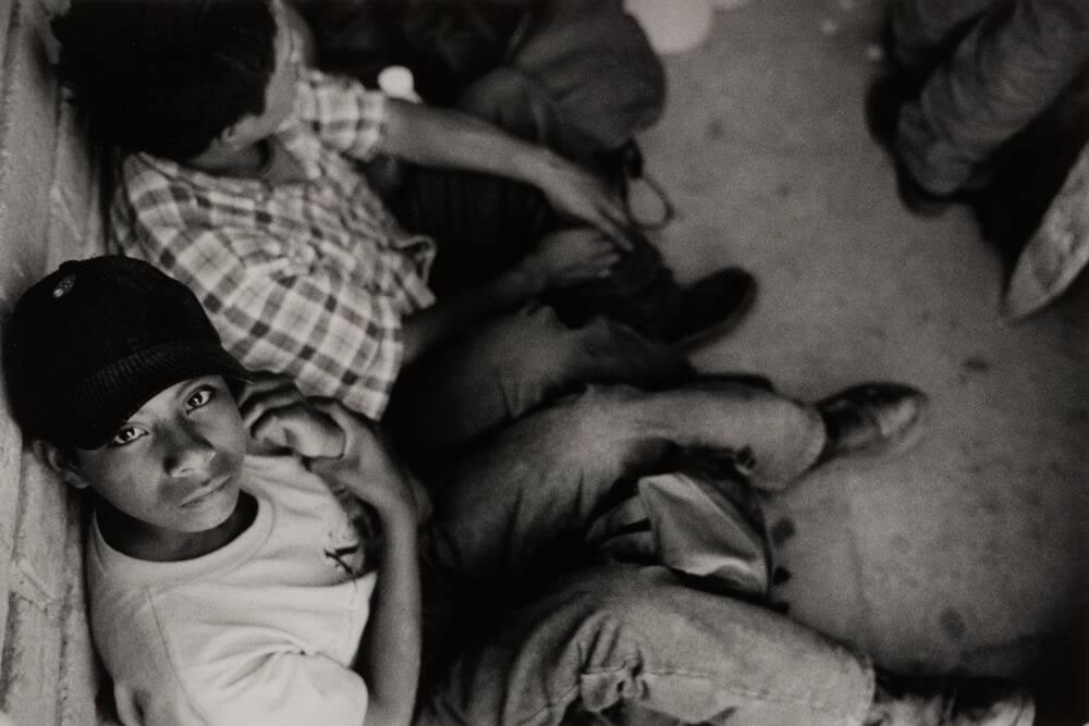 Sixto Méndez Goyazo, 14, from Chiapas, has never attended school. He is illiterate, knows nothing of the U.S., nor where he is going to be taken to work after crossing the border at Sásabe. Sixto travels with his 32-year-old uncle Felipe Coyazo, a peasant who lost his livelihood in Chiapas due to uncompetitive Mexican corn prices under NAFTA. Sixto wants to work in U.S. to support his parents. Sásabe, Sonora