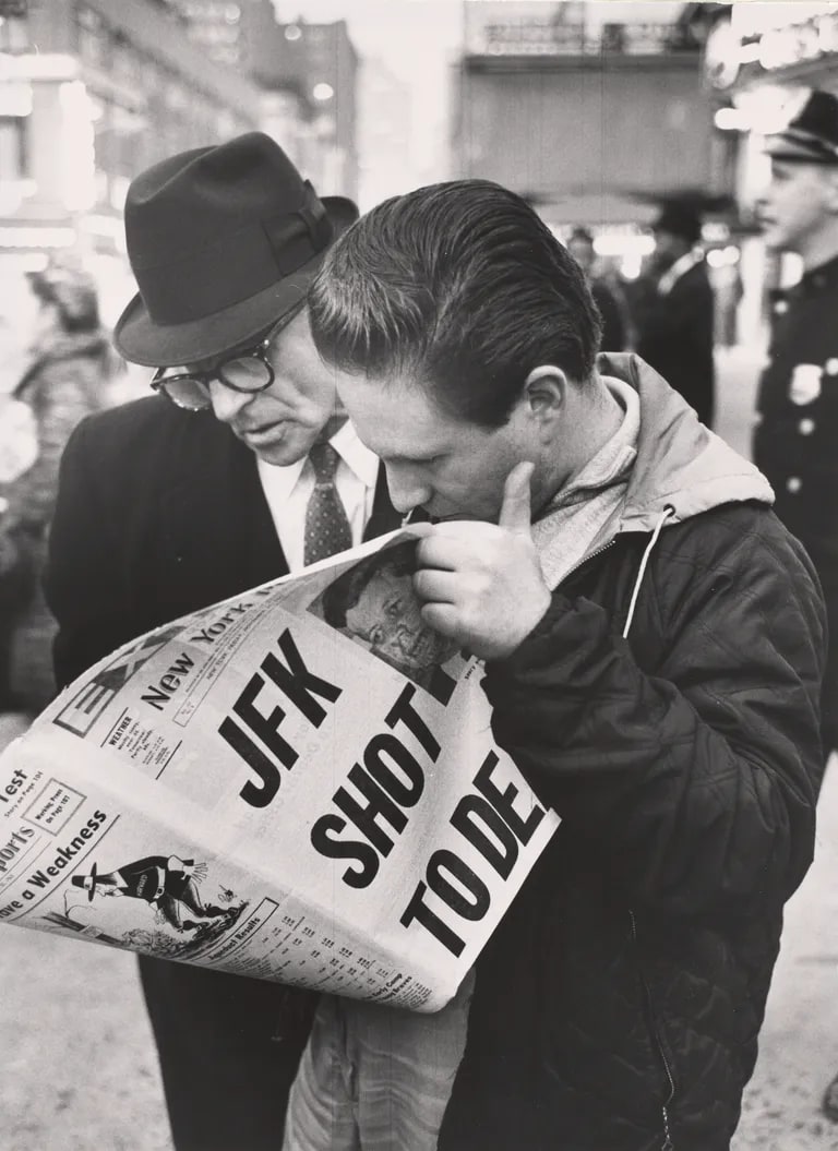 New Yorkers reading of President John F. Kennedy's assassination